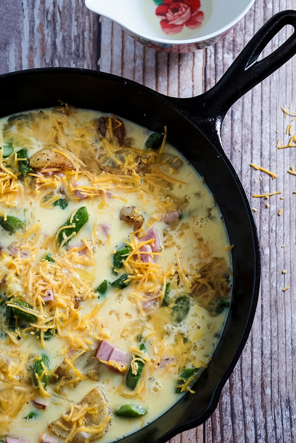 Next the eggs are added to the vegetables before going into the oven.